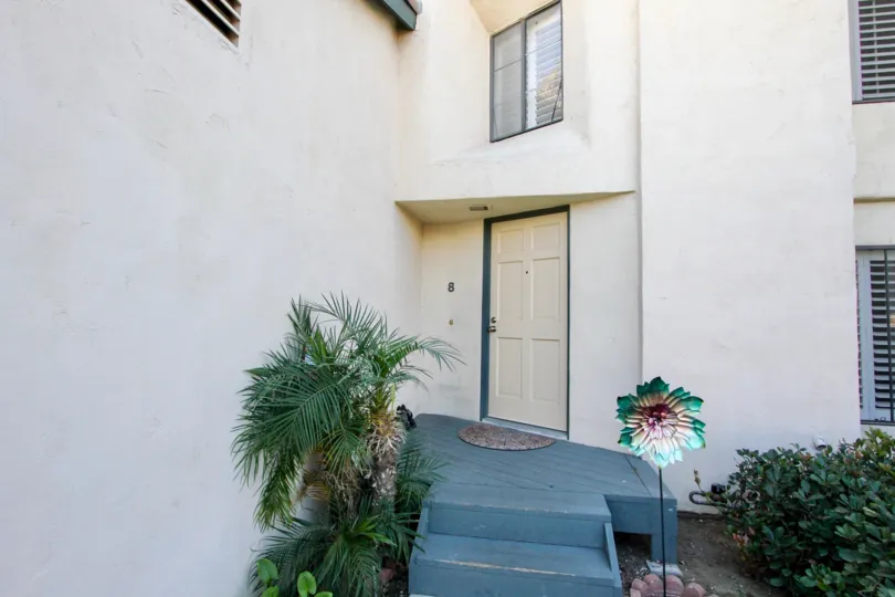 The Front side of the door in a house shows good decoration in Black Mountain Villas of Mira Mesa City