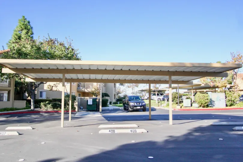 Covered park near residential units at Canyon Park Villas in Mir Mesa California