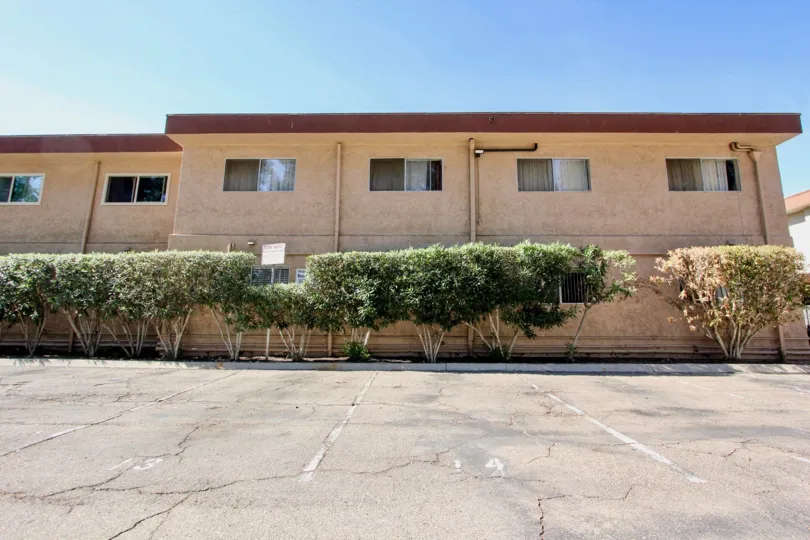 Sunny day in front of open parking space in Carroll Canyon Gardens, Mira Mesa, CA