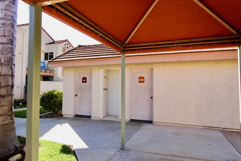 Restrooms under a canopy at Casa New Salem in Mira Mesa California