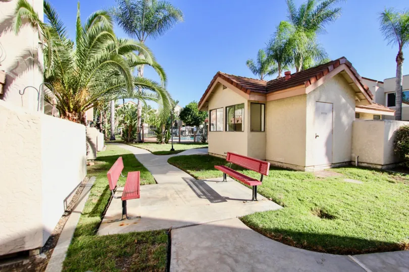 Walkway with chairs and trees in Casa New Salem, Mira Mesa, CA