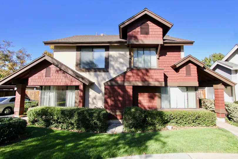 A sunny day in the area of Concord Square, outside, house, car, porch, windows, grass
