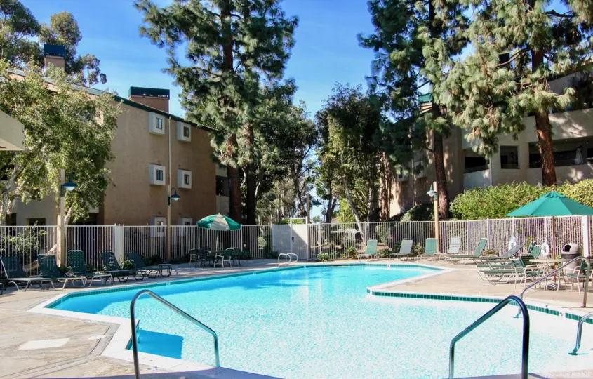 Swimming pool surrounded by residential buildings at Creekside in Mira Mesa California
