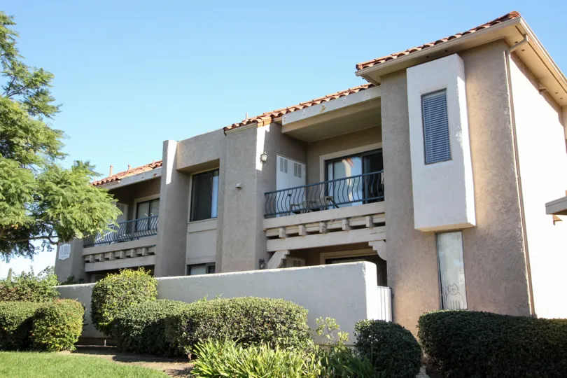 Two story residential units with cement wall at Flair in Mira Mesa California