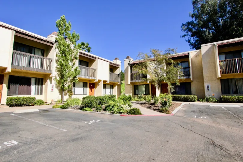 Parking lot surrounded by residential buildings at Gold Creek in Mira Mesa California