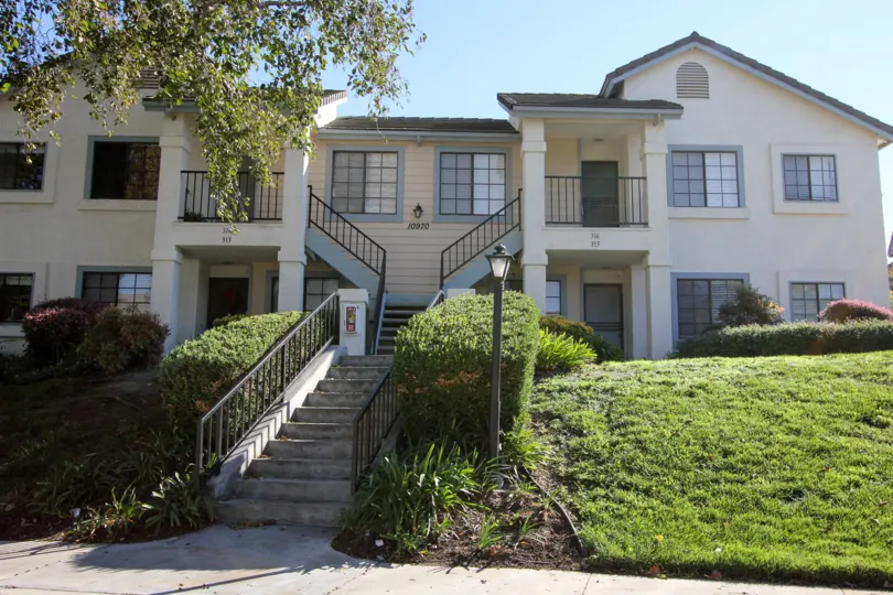 A WARM DAY IN THE HERITAGE AT CON CORD SQUARE WITH A HOUSE THAT HAS STEPS TO GET IN