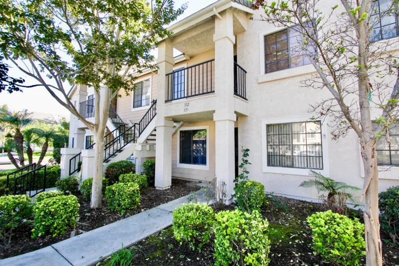 Heritage at Concord Square Mira Mesa California white house with large windos and garden