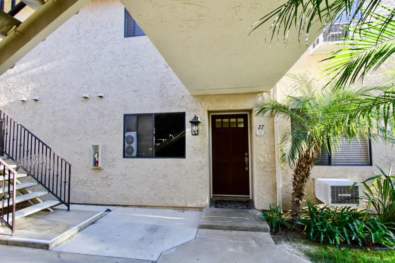 Residential unit with attached stairway at Jade Coast in Mira Mesa California