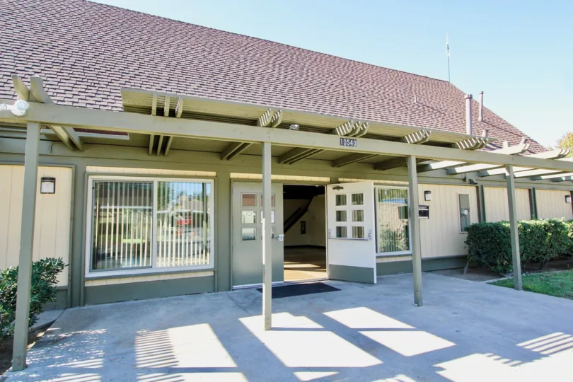 Single story building with canopy over it's entrance at Mesa Village in Mira Mesa California
