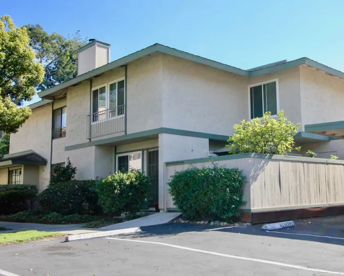 A sunny day with beautiful trees in front of a villa in Quest area of Mira Mesa