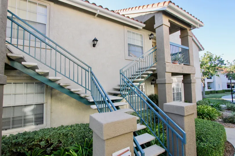 Two story residential units with attached stairways at Summit Ridge in Mira Mesa California