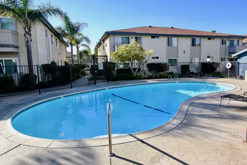 A small gated pool nearby units of the Villa Mar community in Mira Mesa, California.