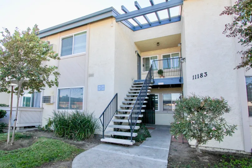 Two story residential units with attached stairway at Villa Mar in Mira mesa California