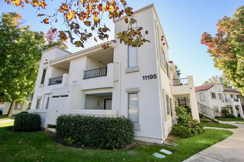 A fall day at Villas at capricorn apartments with lovely landscaping