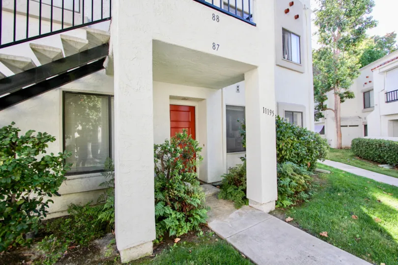 Apartment 87 of Villas at Capricorn showing a red door