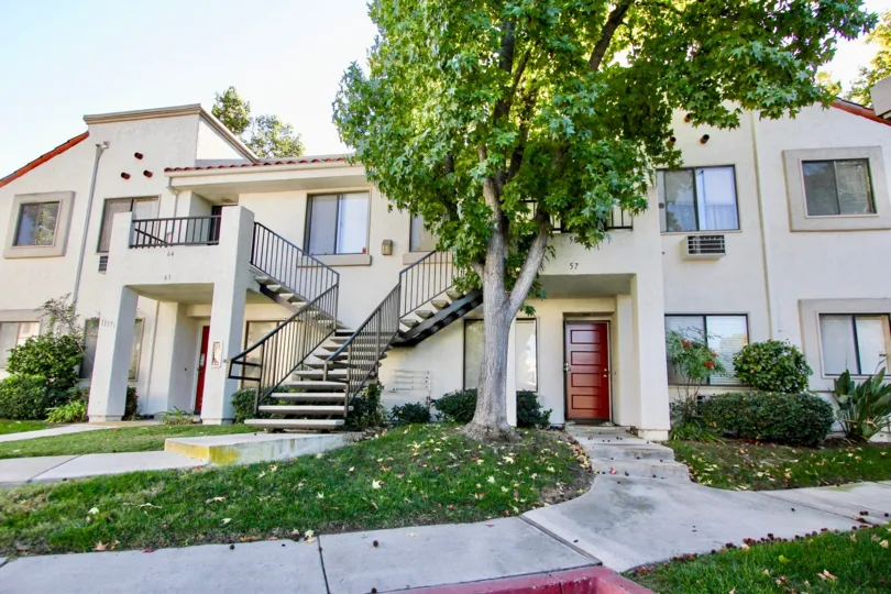 Two story housing units near walkway at Villas at Capricorn in Mira Mesa California