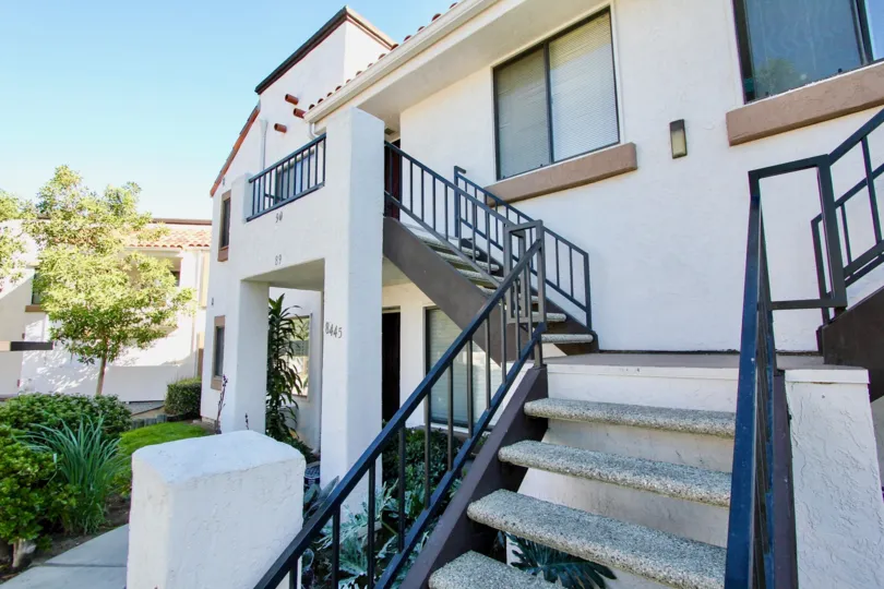 Two story residential units with attached stairway at Villas at New Salem in Mira Mesa California