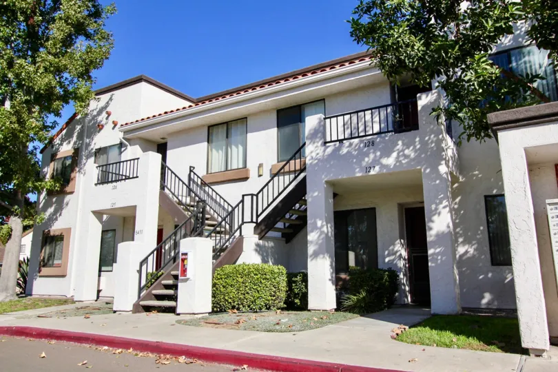 Sunny day blue sky with front staircase of a residence house in Villas at Westmore, Mira Mesa, CA