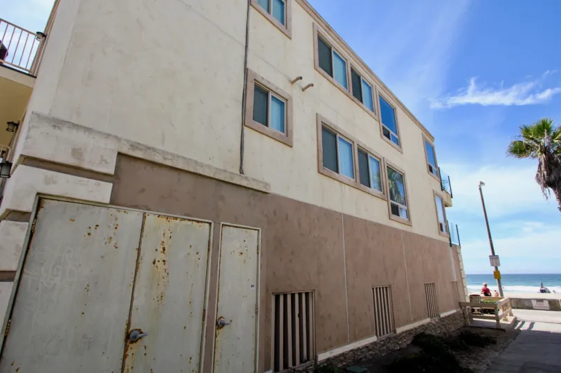 The side of the building at 3243 Ocean Front Walk in Mission Beach, California on a sunny day
