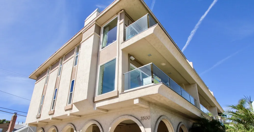 The glass balconies on 3500 Bayside Walk in Mission Beach CA.
