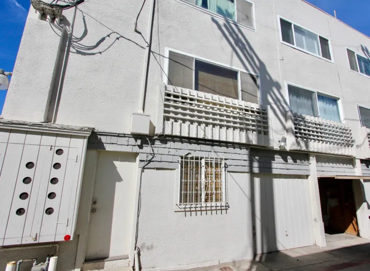 Window view of 711 Island Court, Mission Beach, California with storage space and other units.