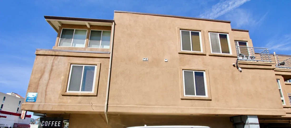 A Tan building in the Bay View Villas area of Mission beach CA.