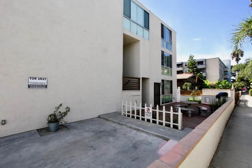 Bonita Grande's Beautiful Outdoor with sitting area and apartment showing glass door and windows, Mission Beach, California