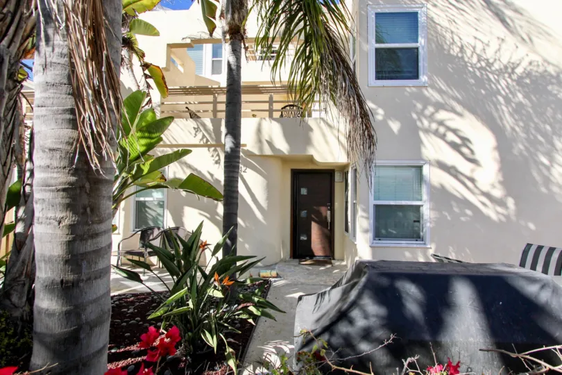 Odd looking brown door at Isthmus Condos in Mission Beach California