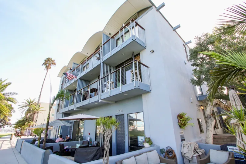 A light blue apartment building in the Mission Shores community of Mission Beach CA.