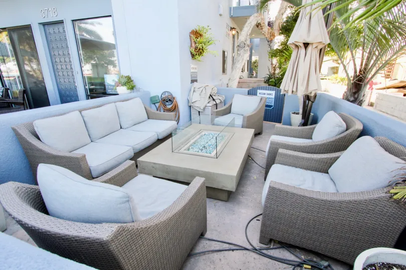 Nice sofa set at portico with cushions and teapai in Mission Shores.
