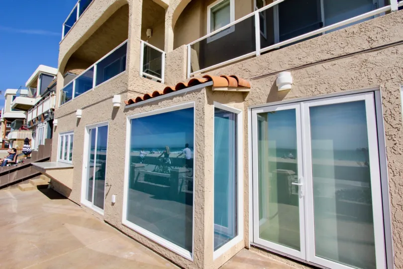 Ocean Front Villas is a beautiful 4 bedroom, 3. 5 bathroom vacation rental at the end of the Boardwalk in South Mission Beach, San Diego. This home not only has ocean and beach views, but also overlooks the channel leading from Mission Bay to the ocean, a
