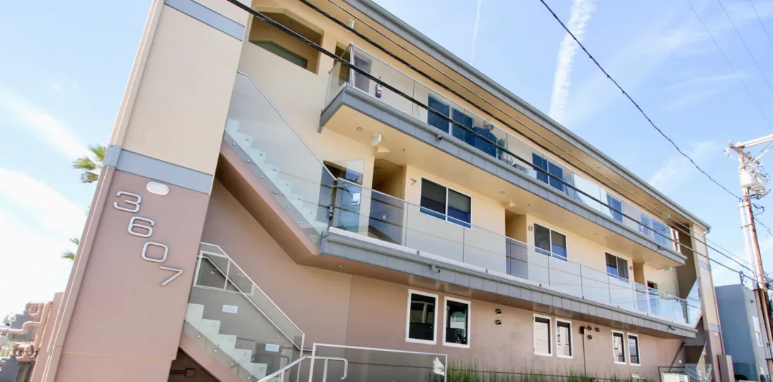 A streetside view of the San Juan Condominiums in Mission Beach, California