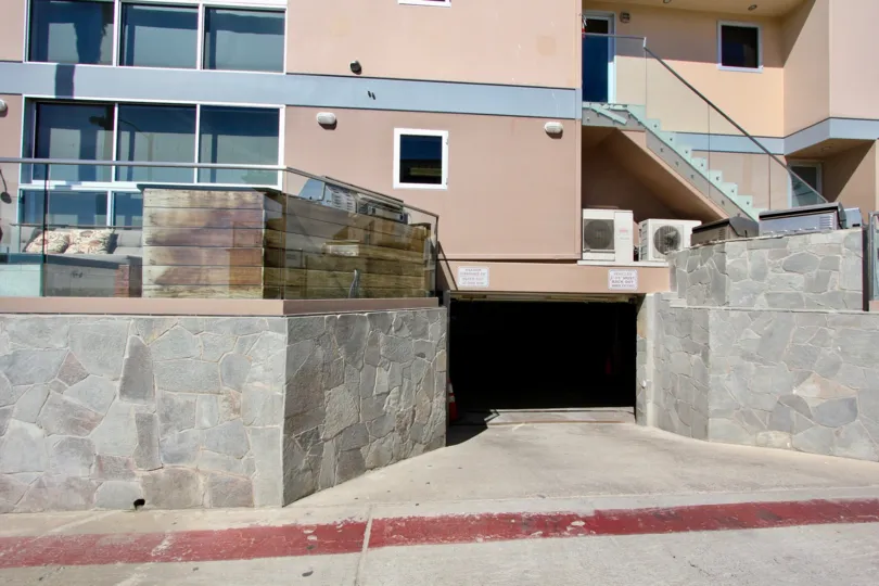 Looking DOwn the Driveway into the parking garage at the San Juan Condominiums in Mission Meach, CA