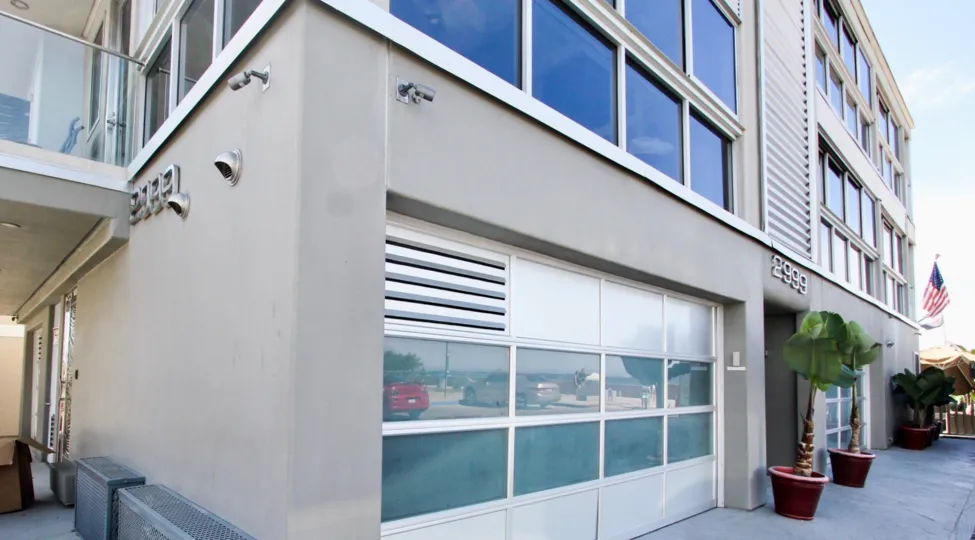 clean and clear maintained front view of the mirror building south beach