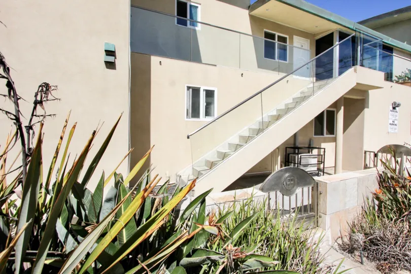 Town homes with see through glass stairways at Surf Rider in Mission Beach CA