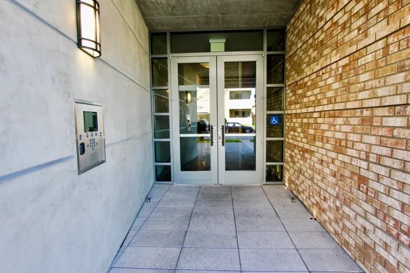 Front door to luxury apartment complex in Mission Hills