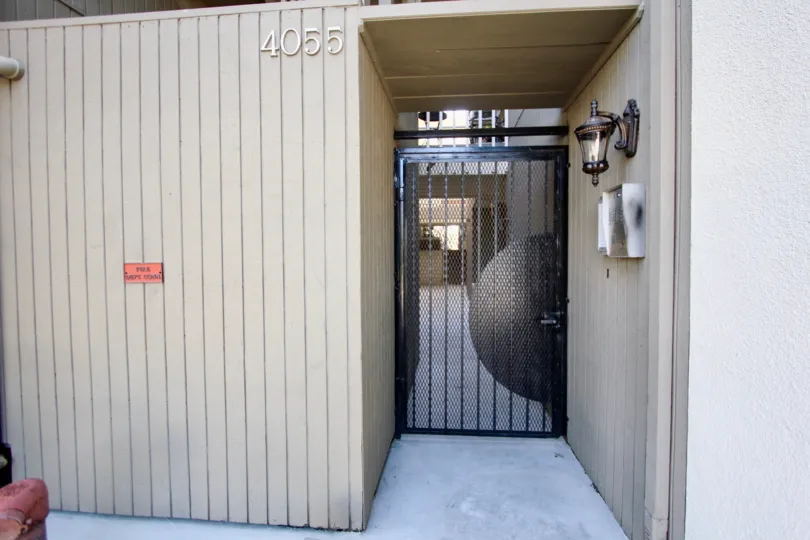 A locked gate outside 4005 Eagle in Mission Hills, CA.