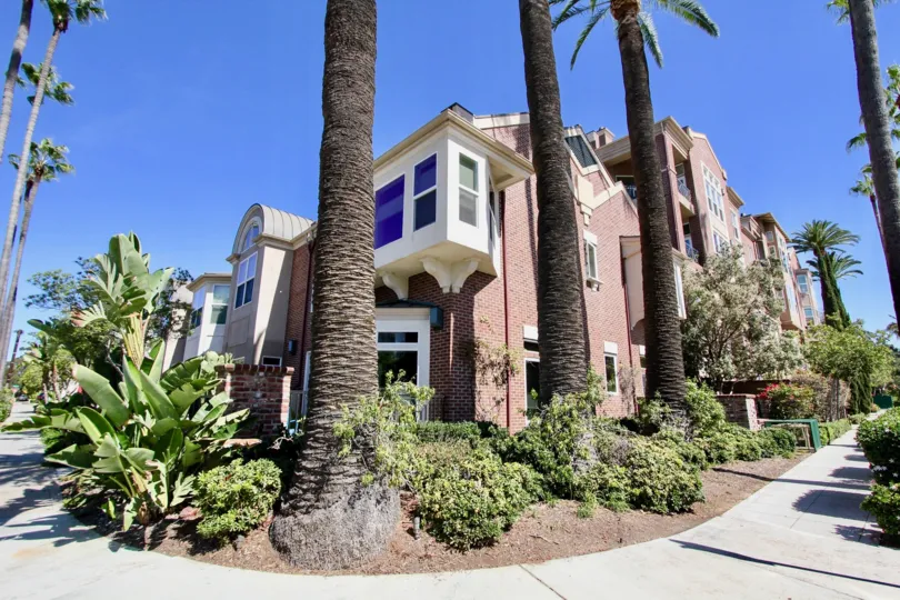 Beautiful landscapes with tall palm trees at gorgeous Cambridge Square in Mission Hills, CA