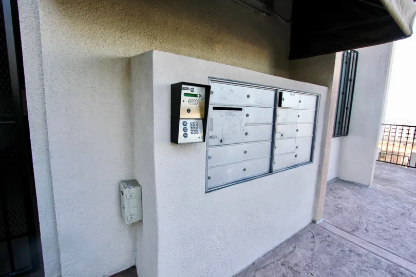 View of postal box in an residence below a balcony in the Columbia Heights