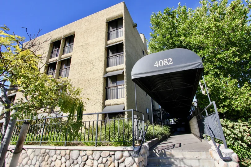The apartment building of cresthill Plaza on a sunny day in mission hills, CA