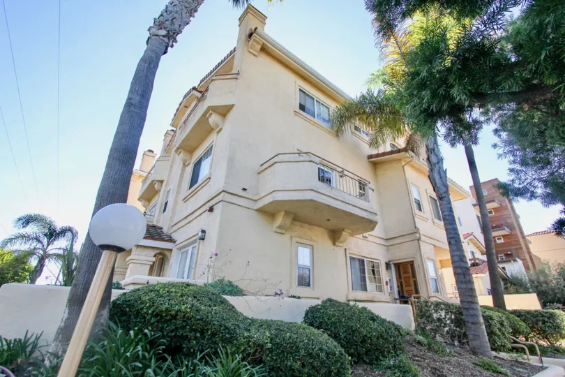 A day with blue skies and bright trees at Lewiston Condominiums in Mission Hills, California