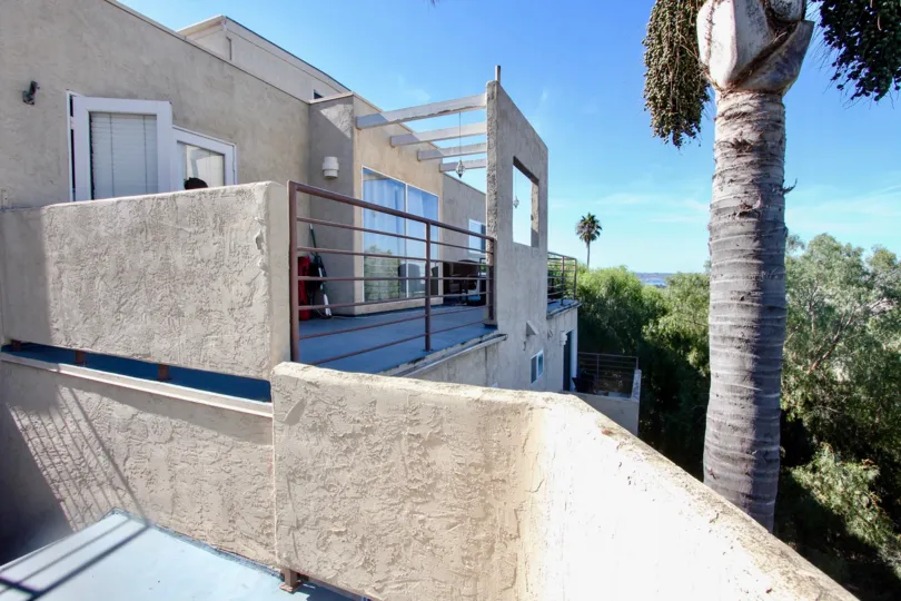 Lasted floor with balcony of a house in the Redwood Condominiums