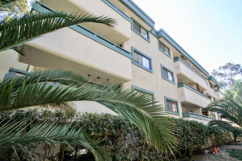 The apartment in the Torrance Canyon has 3 floors and in backside has bushes and plants