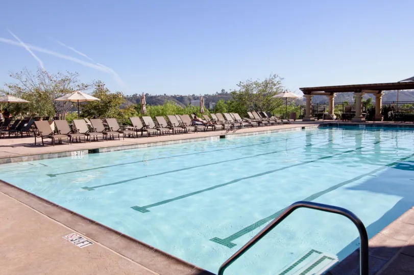 Large rectangle swimming pool with pillars at Bridges at Escala in Mission Valley CA