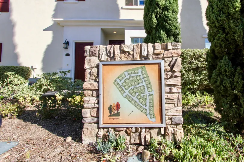 A map of the units in the complex sits in a garden at the Bungalows at Escala.