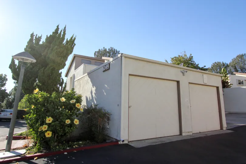 Adorable little house in the Cerro De Alcala community of Mission Valley, California, with 2 garage doors.