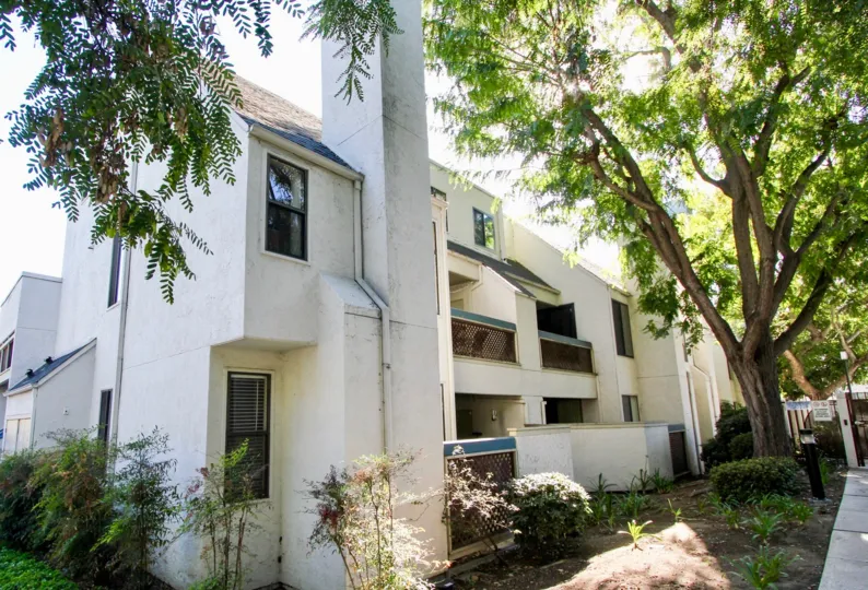 Creekwood at River Run,: Mission Valley ,California,trees,white building