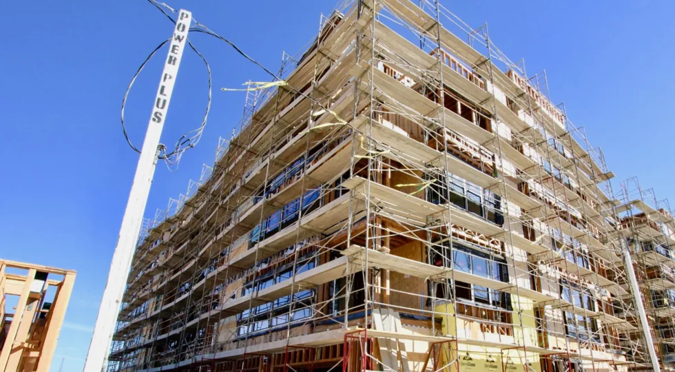 The Lucent Lofts luxury building under construction on a sunny afterhoon.