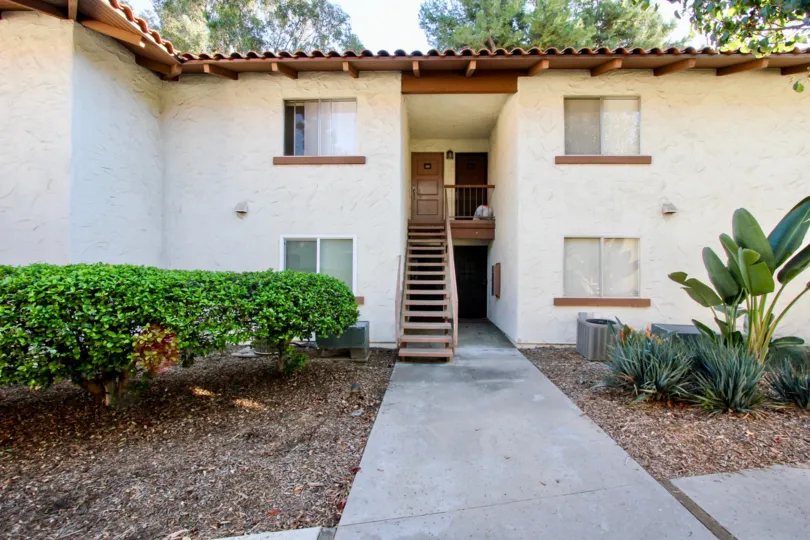Two story home with attached stairway inside MIssion Plaza at Mission Valley CA