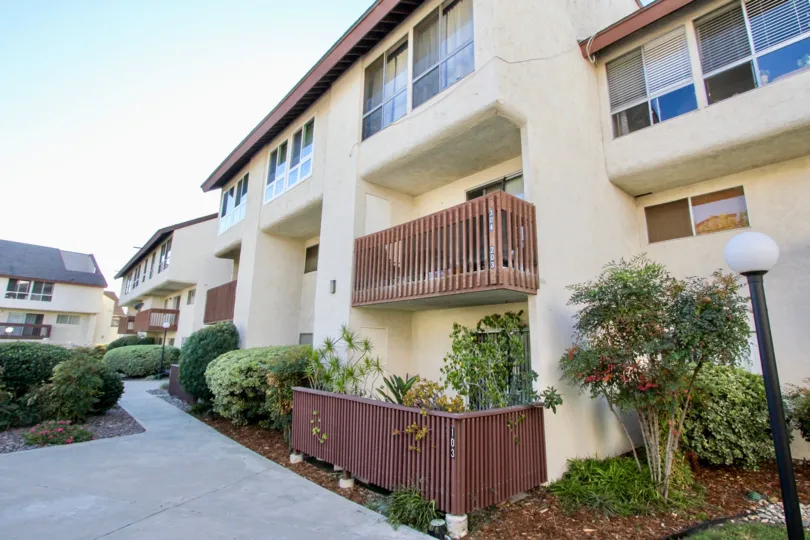 A sunny day in Mission Verde apartment complex with green landscaping